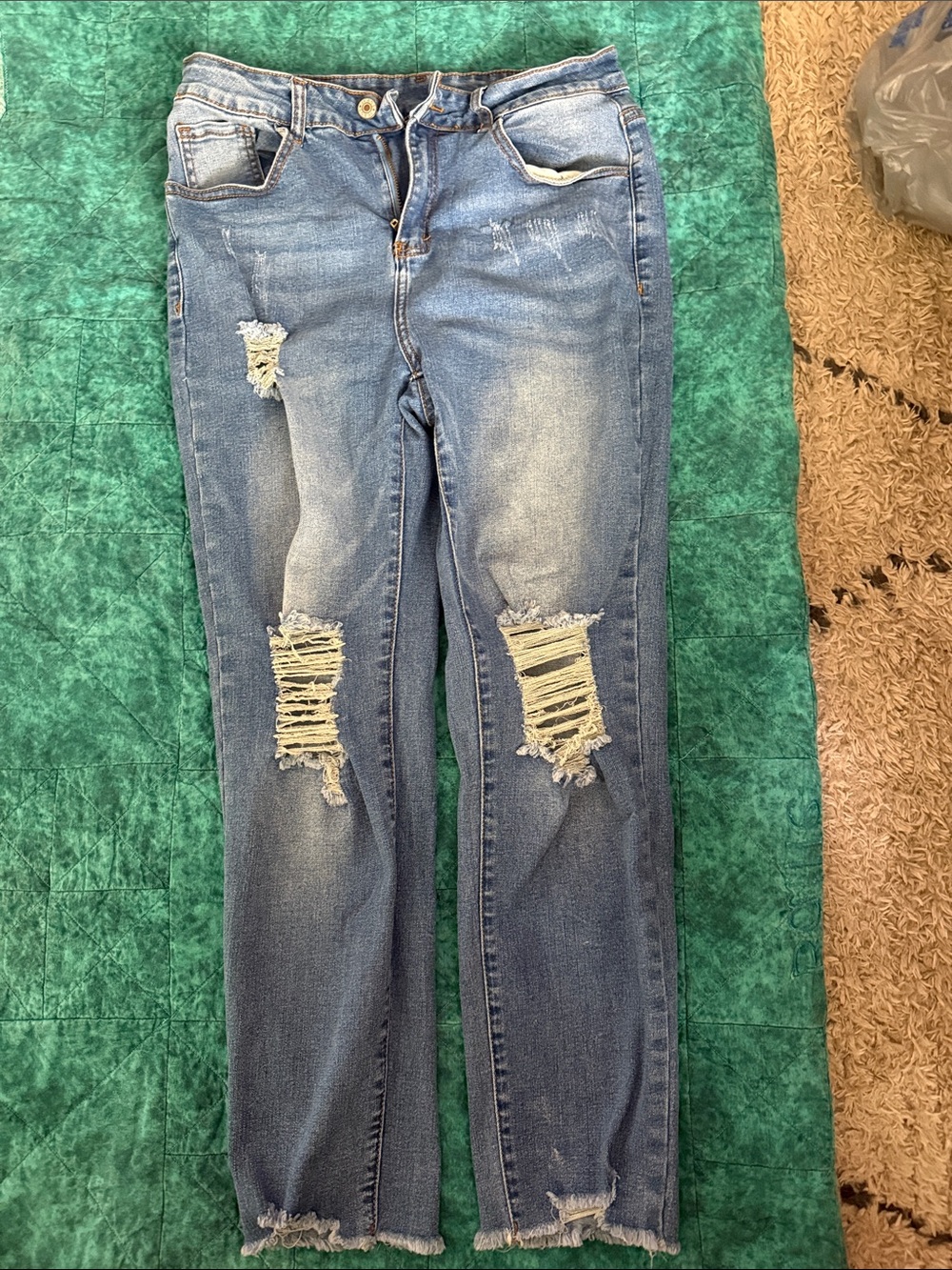 Amazon Women's Blue Distressed Skinny Jeans with Ripped Knees